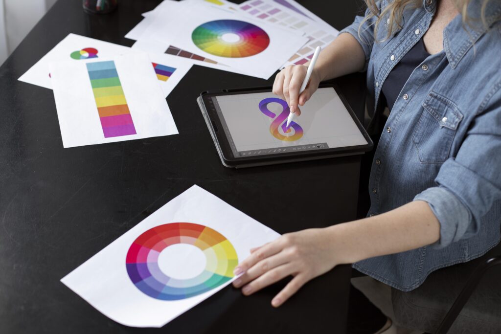 young-female-logo-designer-working-graphic-tablet